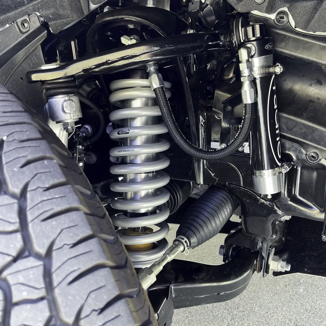 Radflo Oe Replacement 2.5 Front Coilover Kit Toyota Tacoma 2024+ With Remote Reservoir Extended For Use With Aftermarket Upper Control Arms 2.5″ Lift 2